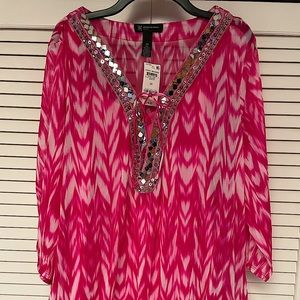Pink & white pull over blouse.